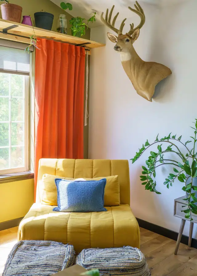 Yellow chair that folds down to extent the leg rest with hidden legs in zippers at Garden House, Coeur d'Alene Idaho