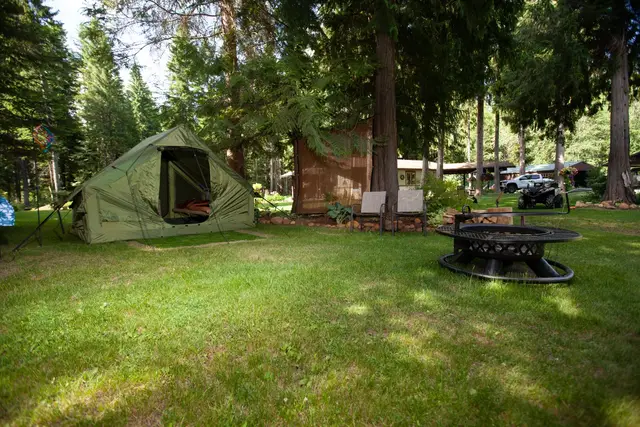Campsite grounds with fire pit at Woodland Tipi, Sandpoint Idaho