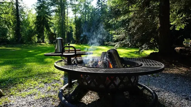 Outdoor fire pit in the woodland at Woodland Tipi, Sandpoint Idaho