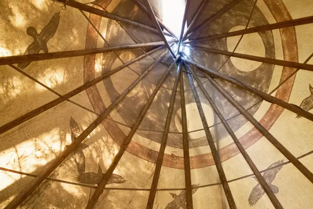 Authentic tipi pole structure overhead at Woodland Tipi, Sandpoint Idaho