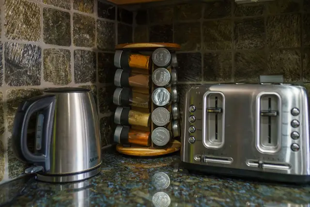 A kettle, toaster, and spice rack help make everyday meals feel easy at Riverstone Village Retreat, Coeur d'Alene Idaho
