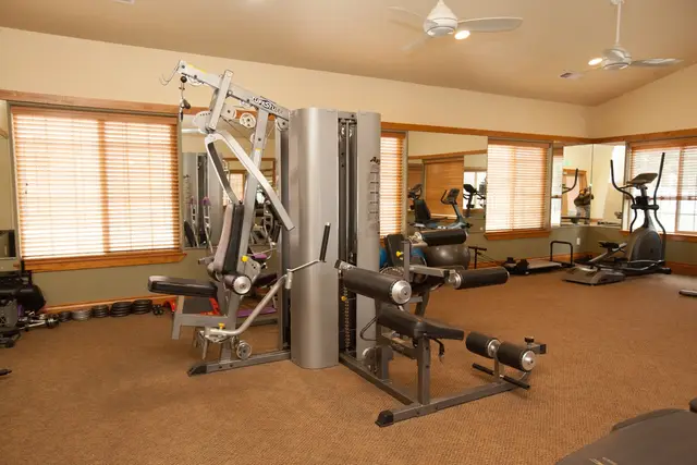 Gym equipment with cable machine, elliptical, treadmills, free weights at Pheasant Run Condo, Coeur d'Alene Idaho