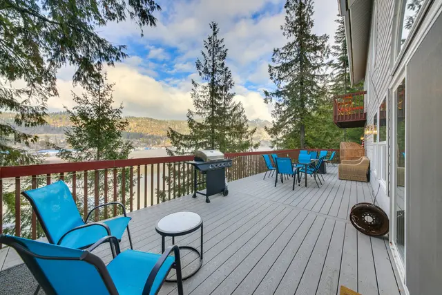 Lake and Mountain views from the Deck off the main level of home at Bay-View Cabin, Bayview Idaho